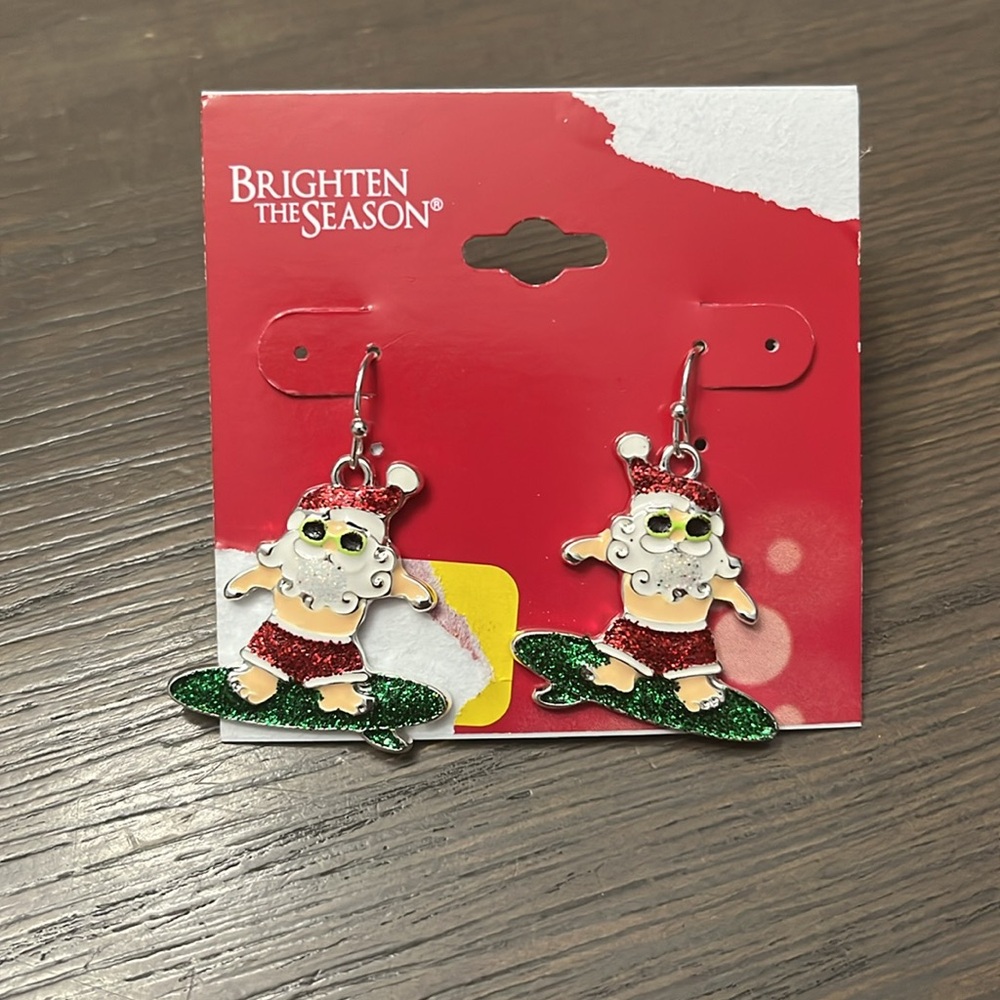 New! Santa riding on a surfboard  Earrings
